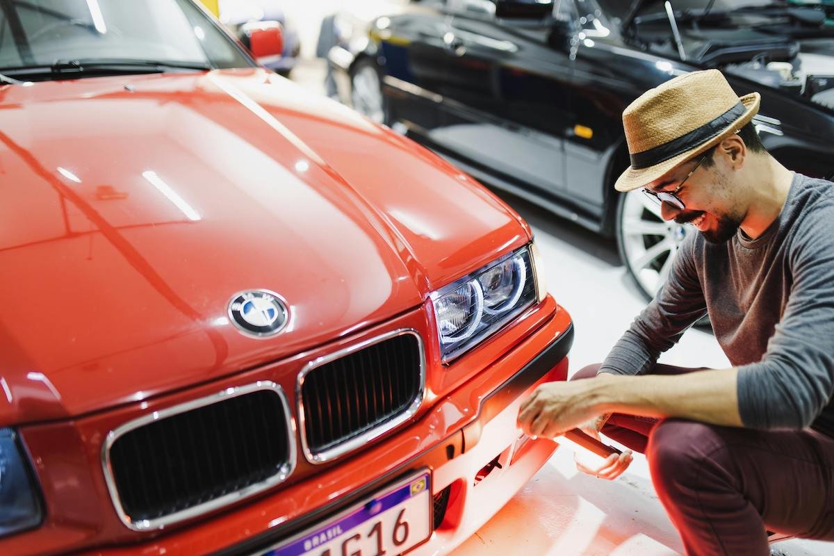 Man inspecting BMW E36 3 Series