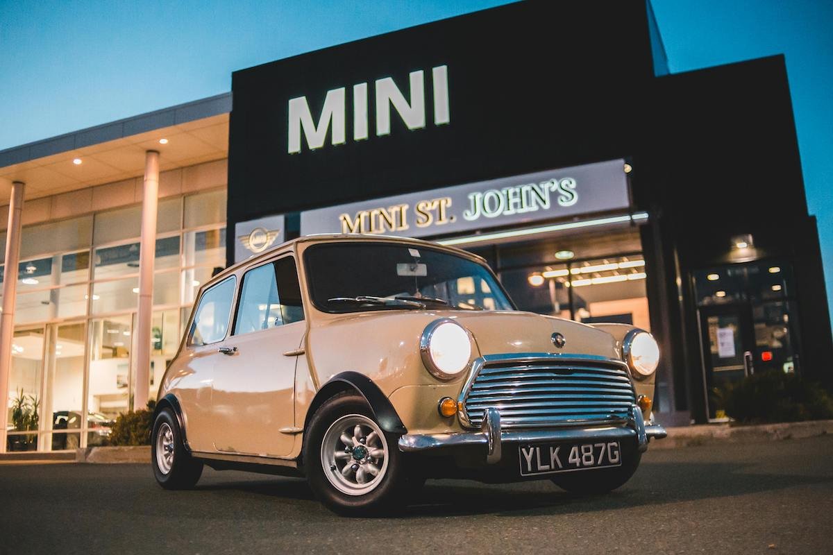 Classic Mini in front of dealership