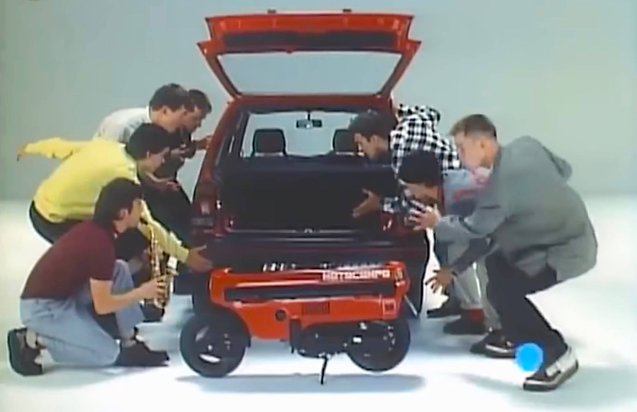 Honda City and Motocompo with the band Madness