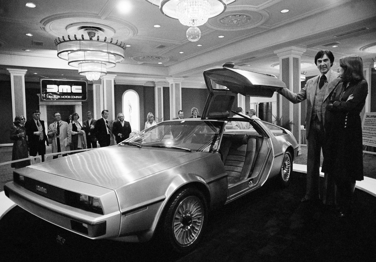 John DeLorean with a DeLorean prototype car