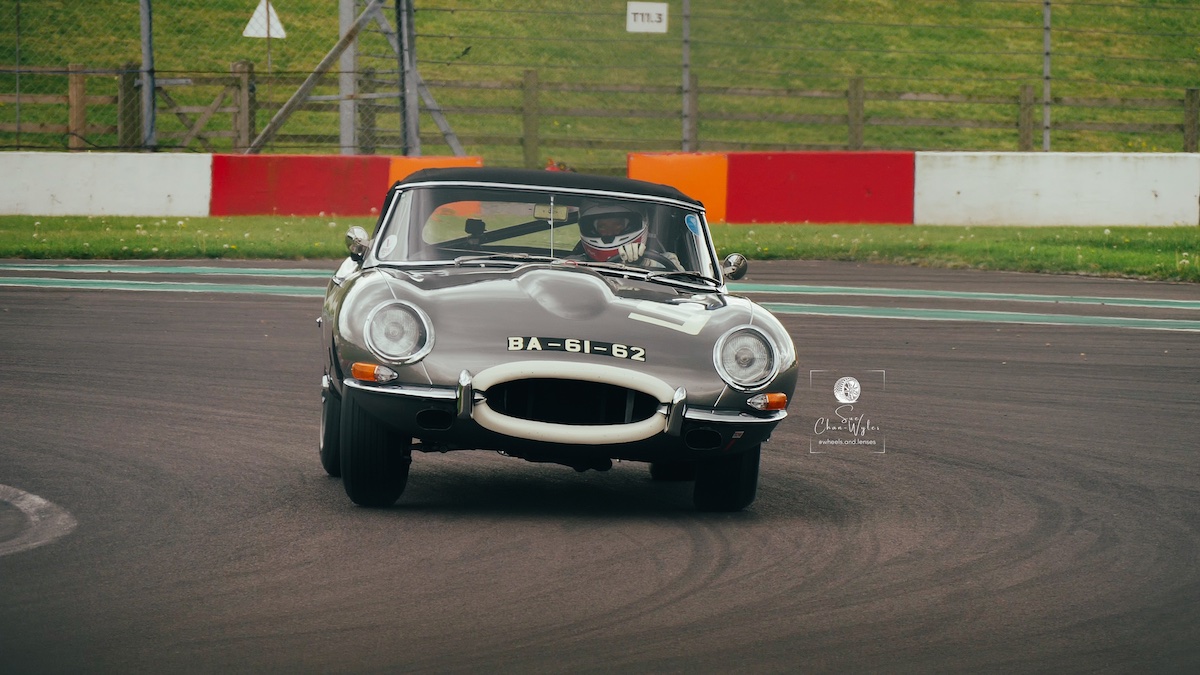 A Jaguar E-Type being driven by Gordon/Finburgh (#9) as part of the Pre ’63 GT series