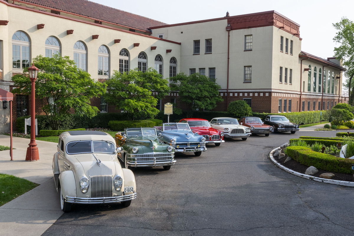 Chrysler historical vehicles, on display at the Detroit Yacht Club on Belle Isle on June 4, 2025. Chrysler brand is unwrapping a celebratory slate of initiatives during its birthday week to mark 100 years, including the once-in-a-century opportunity for media to drive and see on display historic Chrysler vehicles.