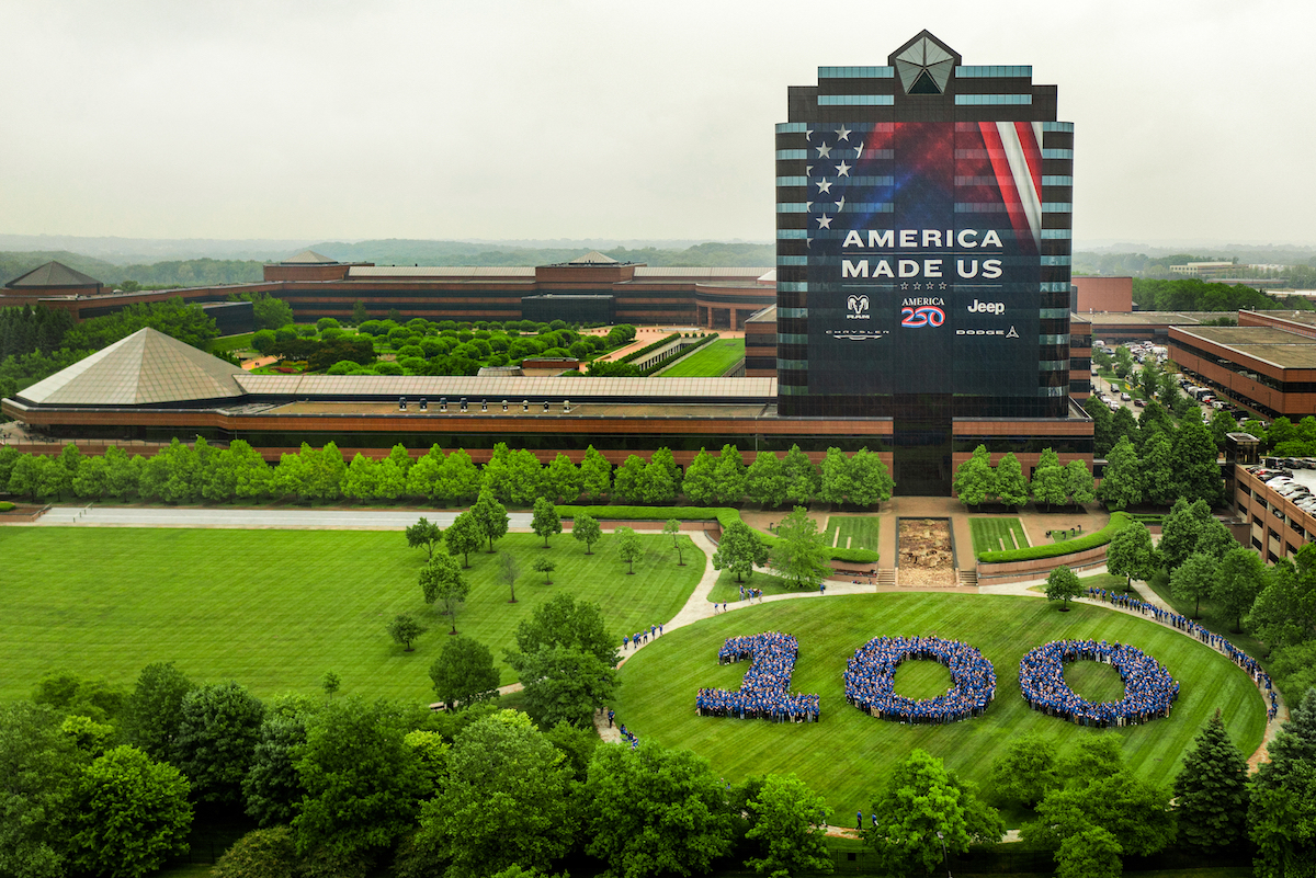 Chrysler officially turns 100 today, June 6, 2025, and the brand is celebrating by recognizing the people who have powered its path to the century mark — a rare accomplishment for any brand or company. More than 1,500 employees came together at the Chrysler Technology Center campus in Auburn Hills, Michigan, on Thursday, June 5 to participate in a special group “birthday” photo honoring the thousands who have worked over the decades to make 100 years of Chrysler possible.