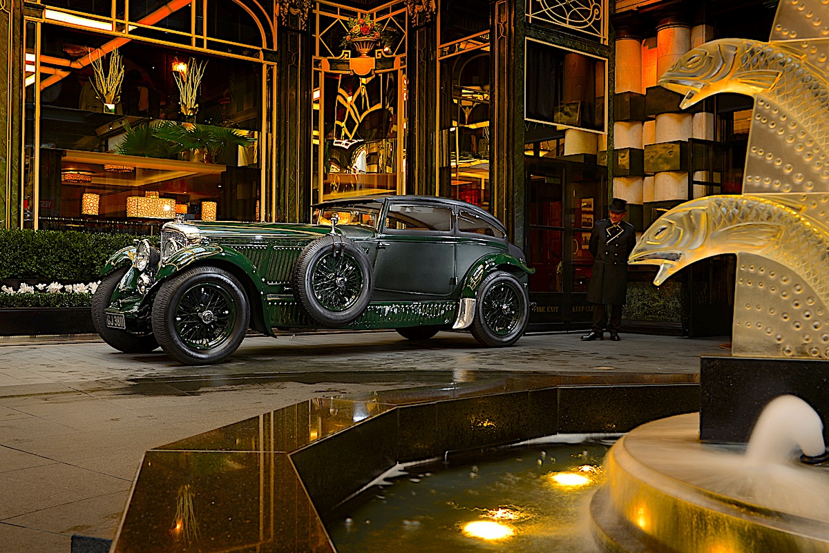 The iconic 'Blue Train' Bentley Speed Six parked outside a luxurious hotel