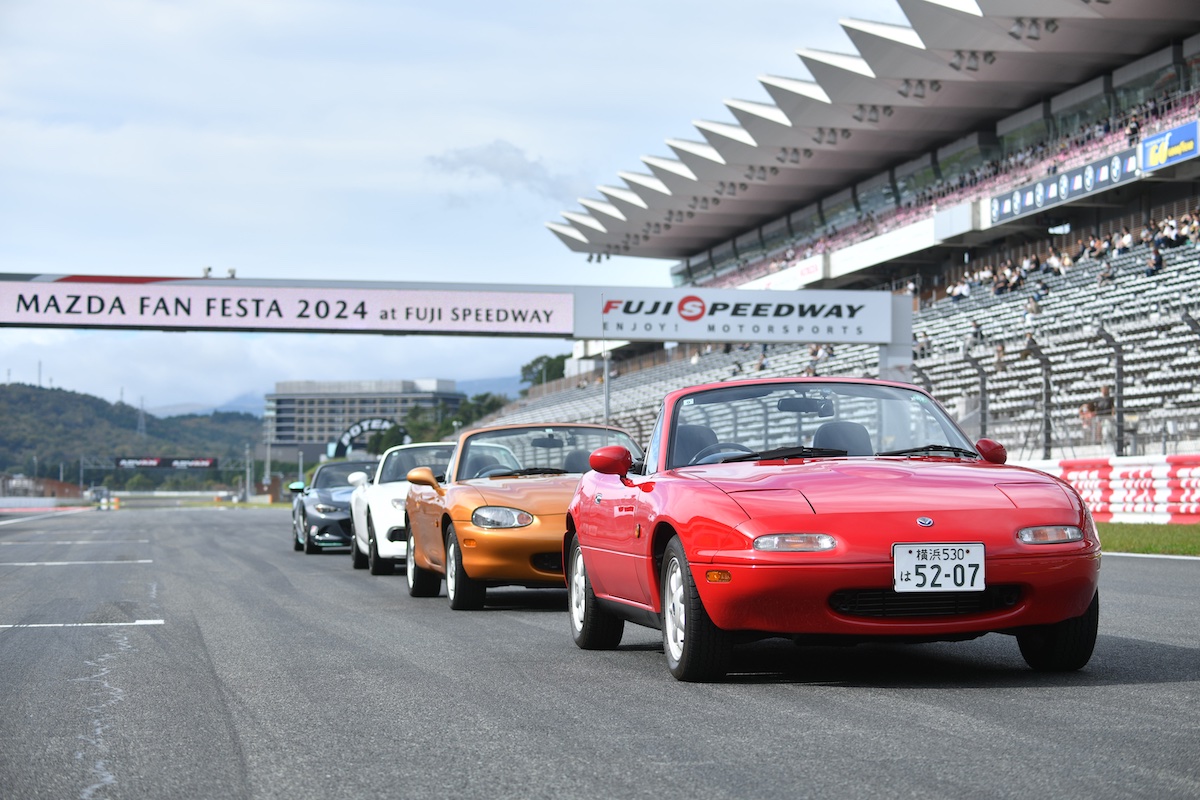 Mazda MX-5s lined up at Fuji Speedway for Mazda Fan Festa 2024