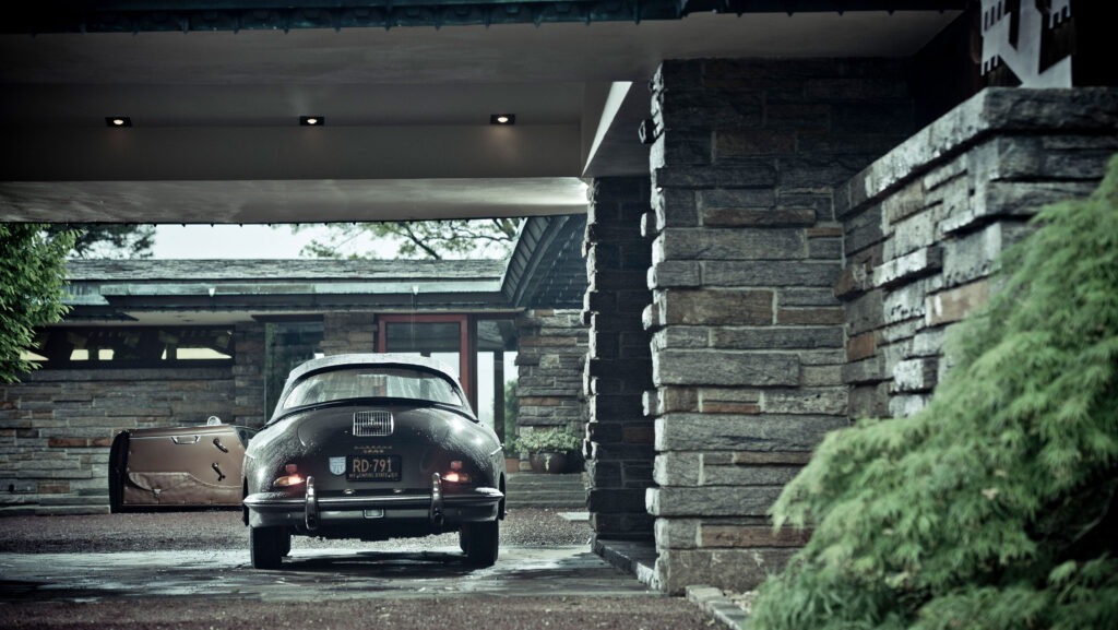 Porsche 356 parked next to the house of Maximilian E Hoffman in Rye, designed by Frank Lloyd Wright