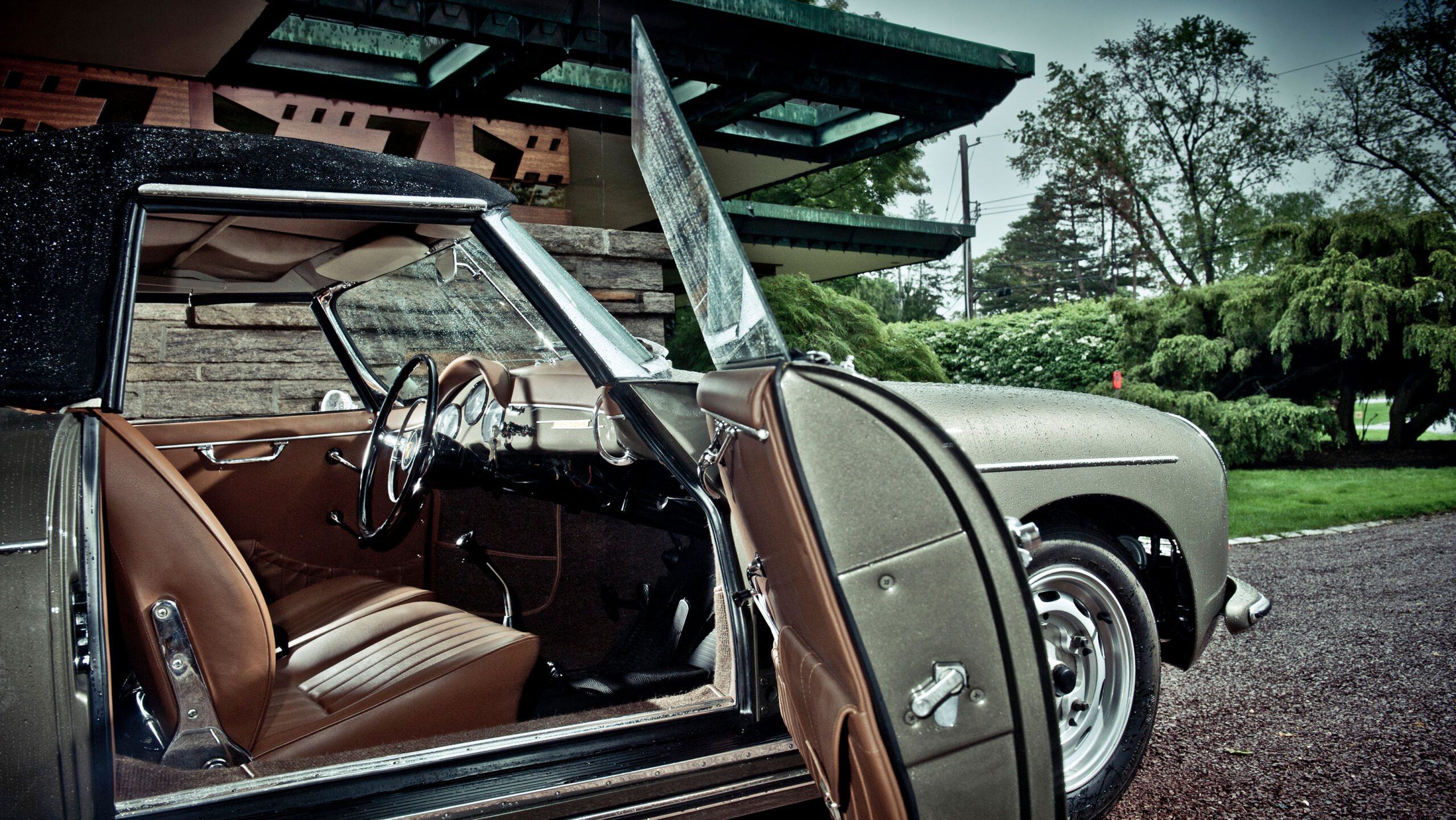 Porsche 356 parked next to the house of Maximilian E Hoffman in Rye, designed by Frank Lloyd Wright