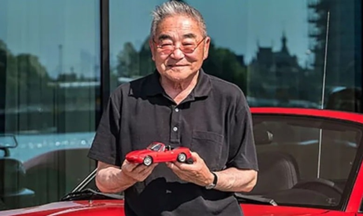 Tom Matano with a Mazda MX-5 model car