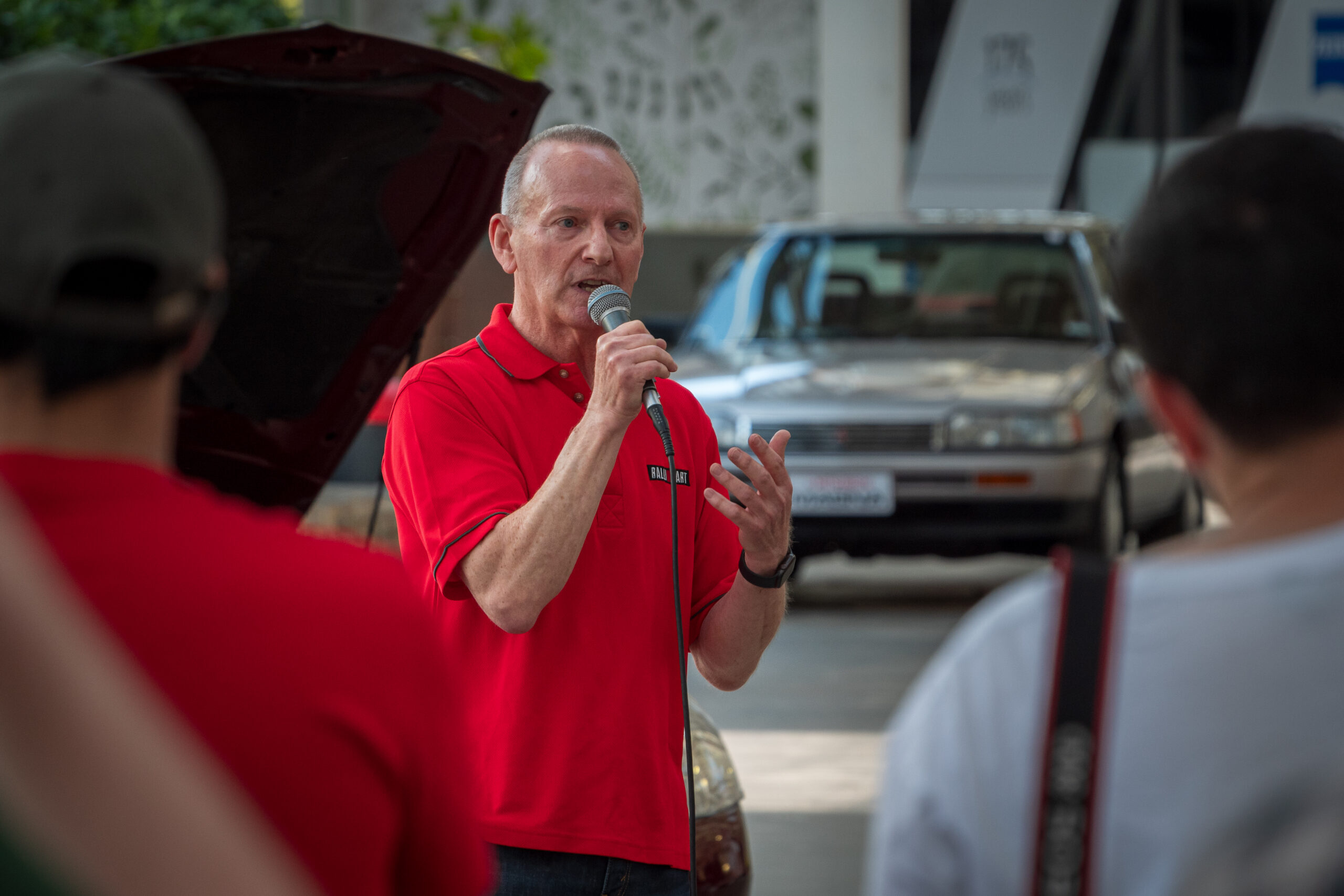 Former Mitsubishi rally driver Ed Ordynski speaking at the Magna40 event