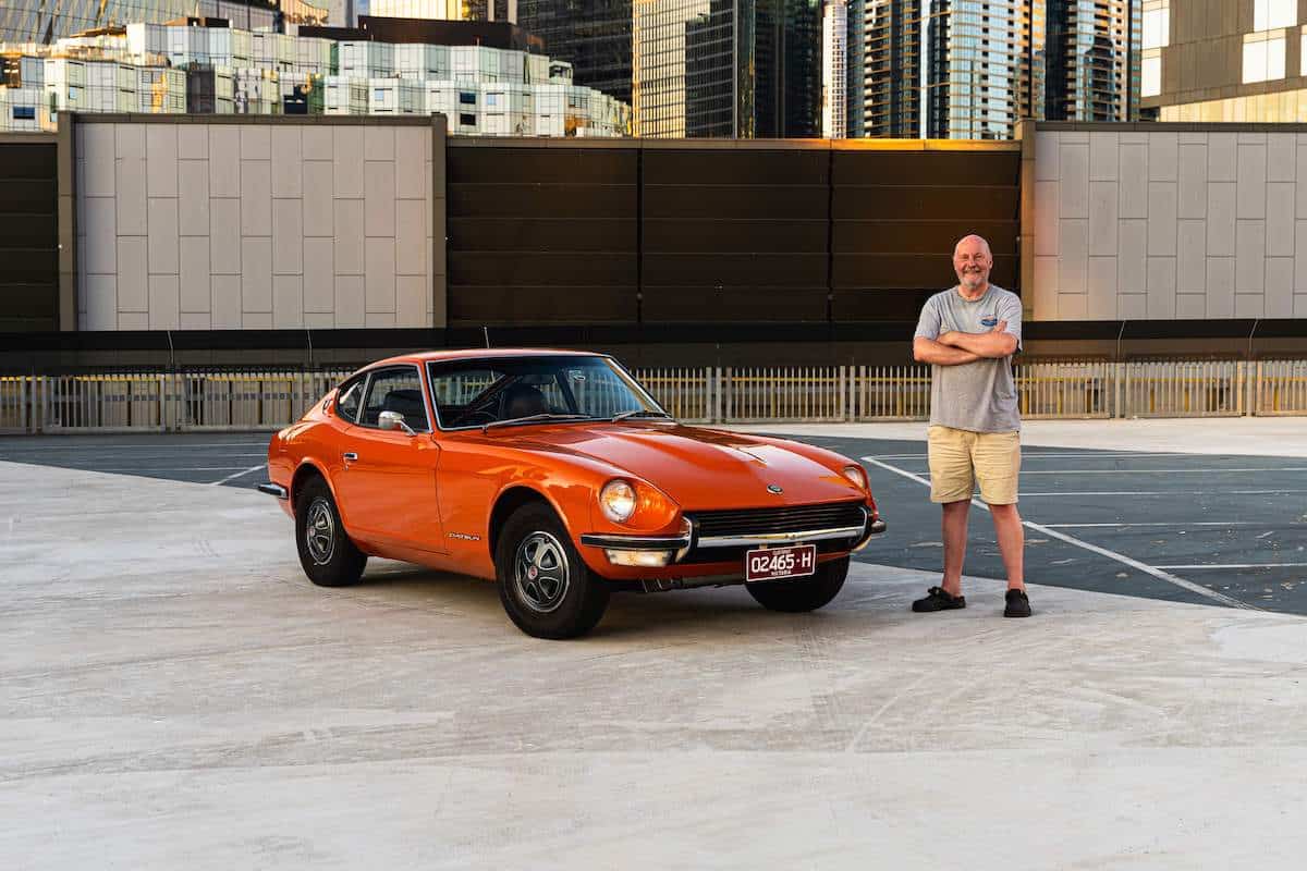 Dave Toleman standing next to his 1972 Nissan 240Z 2+0