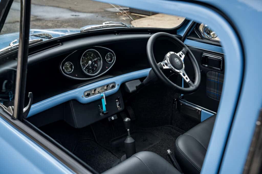 1971 Mini Classic converted to an EV with a Tesla Model 3 small motor by Modern Classic Cars Foundation