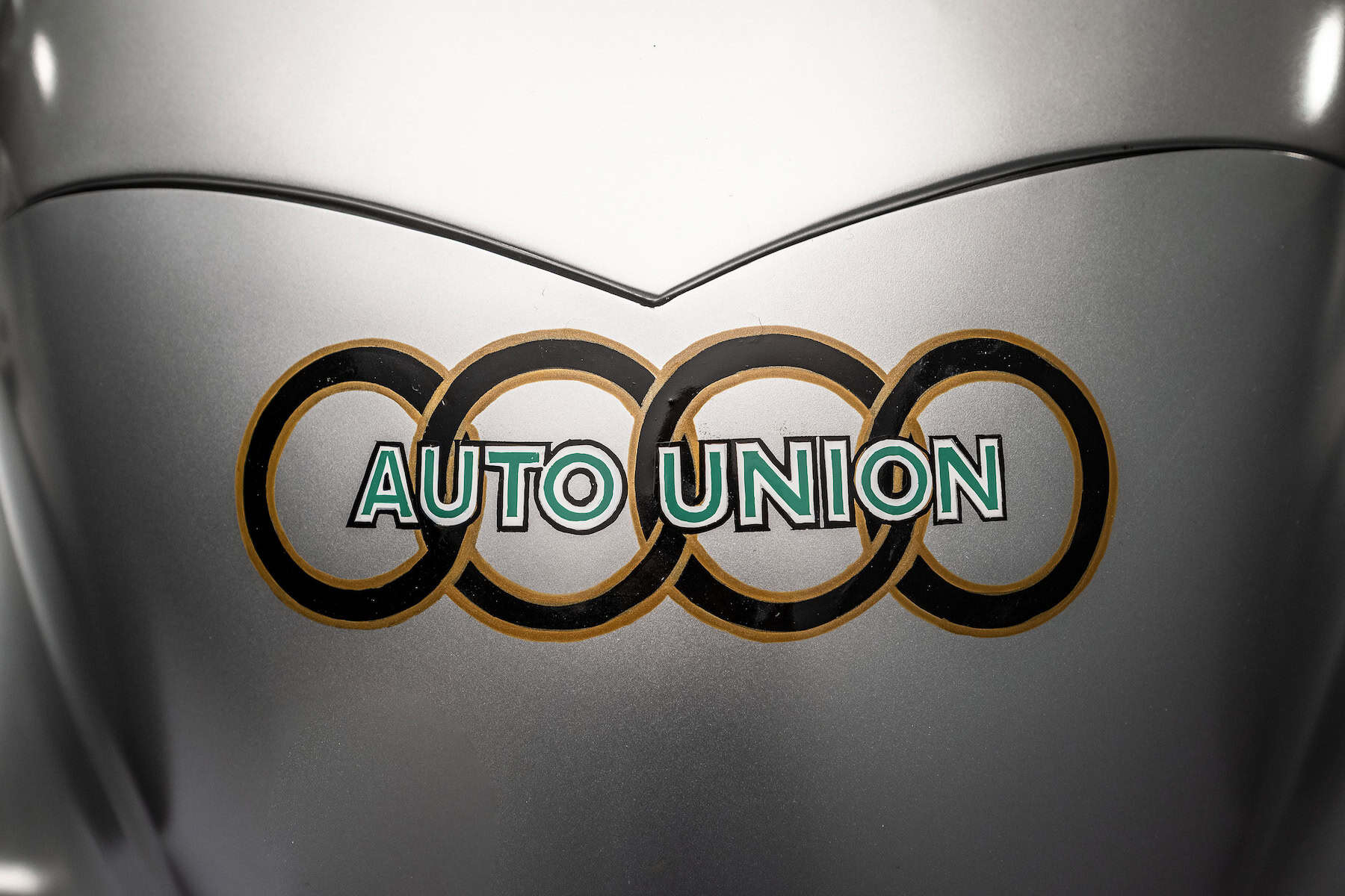 Audi recreated the Auto Union Lucca. After just over three years of construction, the record-breaking car was completed in early 2026. Detail: the Auto Union logo as used on the Auto Union racing cars of the 1930s.