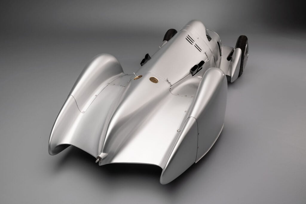 Audi recreated the Auto Union Lucca. After just over three years of construction, the record-breaking car was completed in early 2026. Studio shot. Rear view.