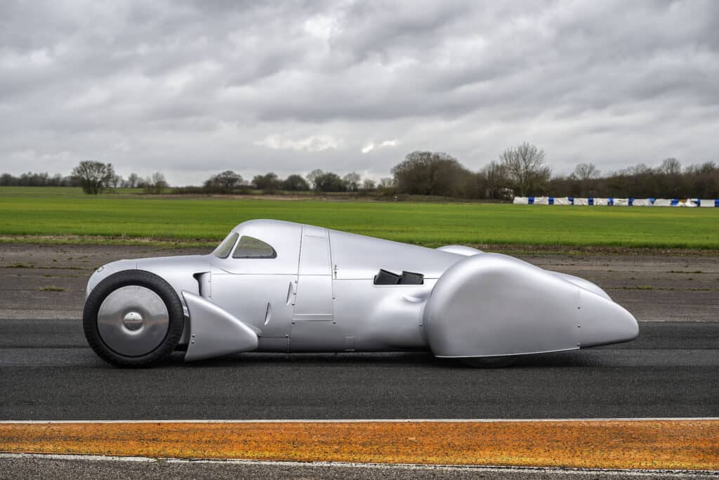 Audi recreated the Auto Union Lucca. After just over three years of construction, the record-breaking car was completed in early 2026. Driving shot at the first roll-out. Side view.
