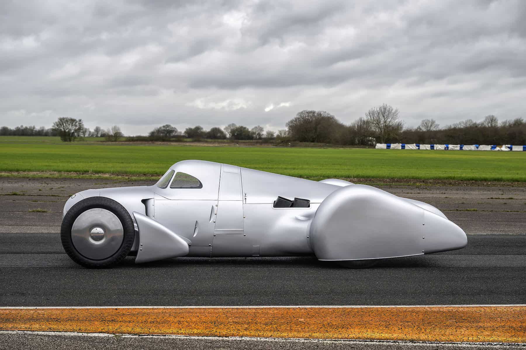 Audi recreated the Auto Union Lucca. After just over three years of construction, the record-breaking car was completed in early 2026. Driving shot at the first roll-out. Side view.