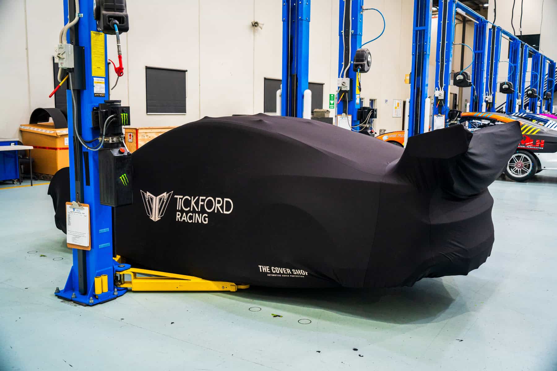 Ford Mustang Supercar hidden under black cover