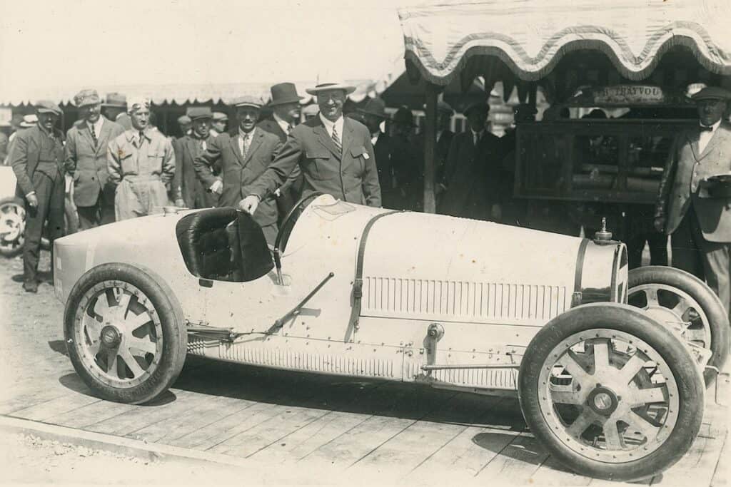 1924 in Lyon: the inaugural Grand Prix of Ettore Bugatti's masterpiece. The Type 35 was the first car with aluminum wheels and would dominate Grand Prix racing with all its derivatives over the next 10 years