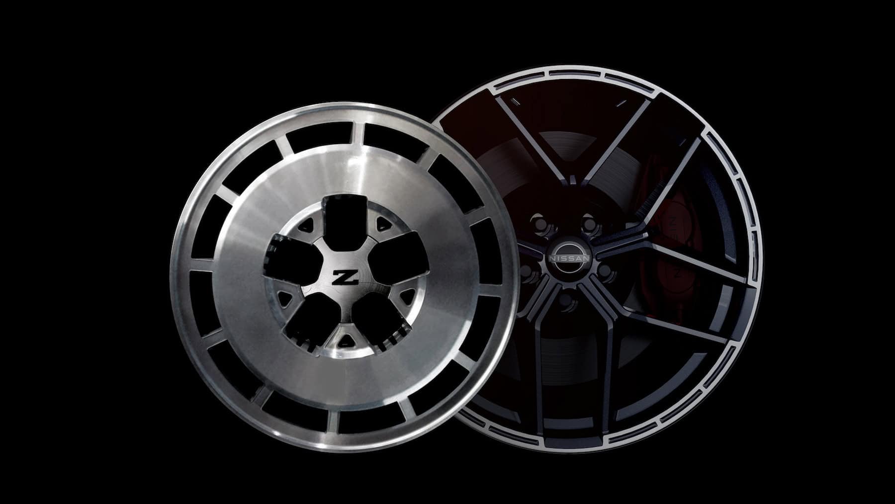 Side-by-side comparison of a historic Nissan Z alloy wheel and a modern Nissan Z wheel design, showing how the contemporary multi-spoke wheel incorporates styling elements inspired by the classic design while being sufficiently sized to provide room for modern high-performance braking systems.