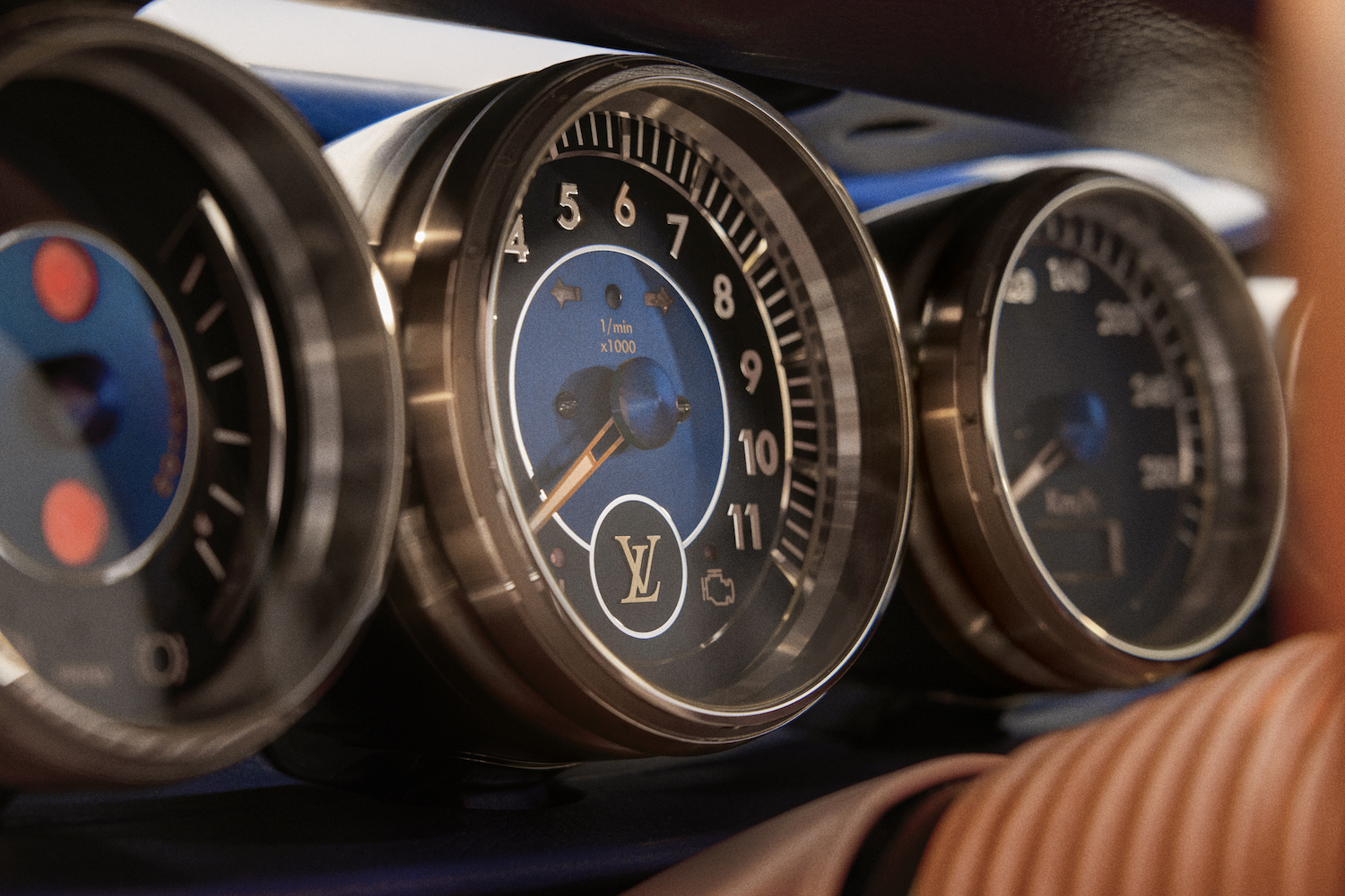 Detail of floating gauge set, showing silver rhodium bezels and LV Blue faces