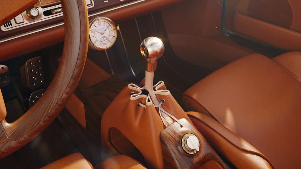 Detail showing removable dash clock, gearshift gaiter inspired by the Louis Vuitton Noé bag, and selector switch for drive modes