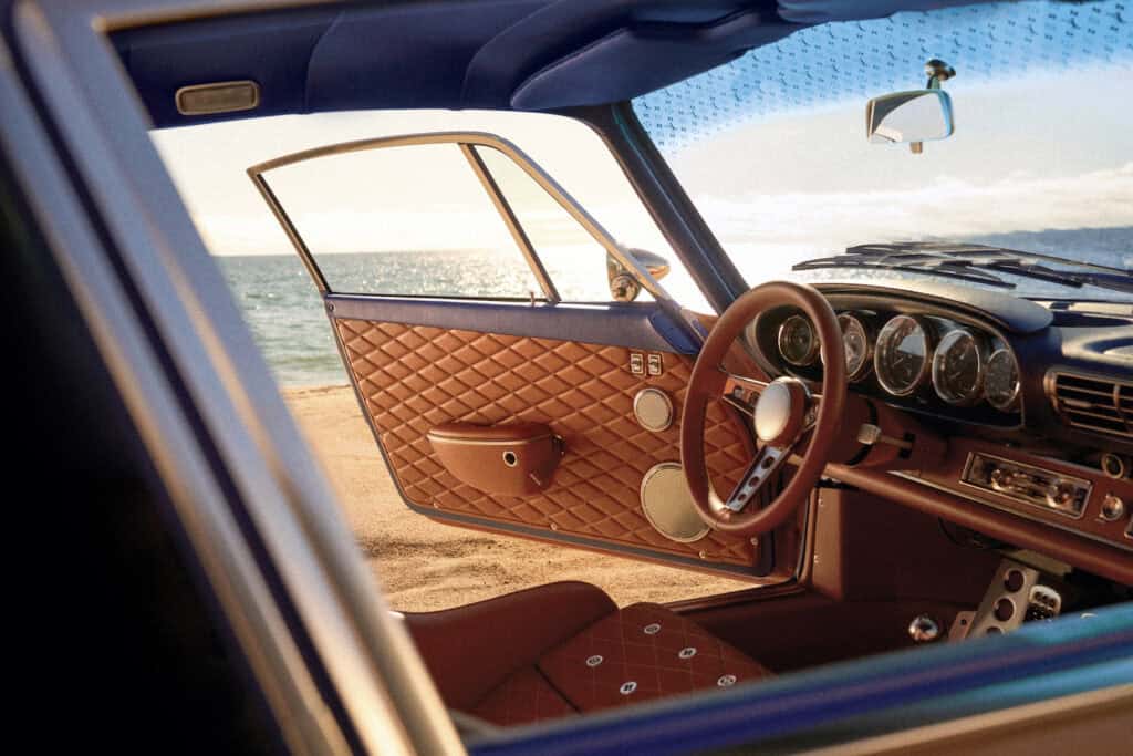 Interior specification showing primary trim in Vachetta (VVT) leather, with headlining and door tops in LV Blue and malletage quilting on door trim.